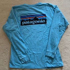 Patagonia Womens Long Sleeve Blue with Logo on Back